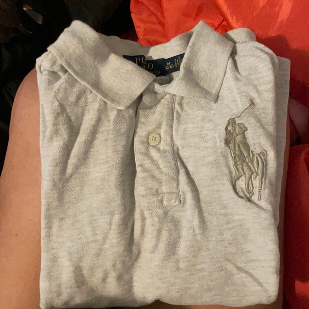 POLO SHORT SLEEVE SIZE MEDIUM IN BIG BOYS .